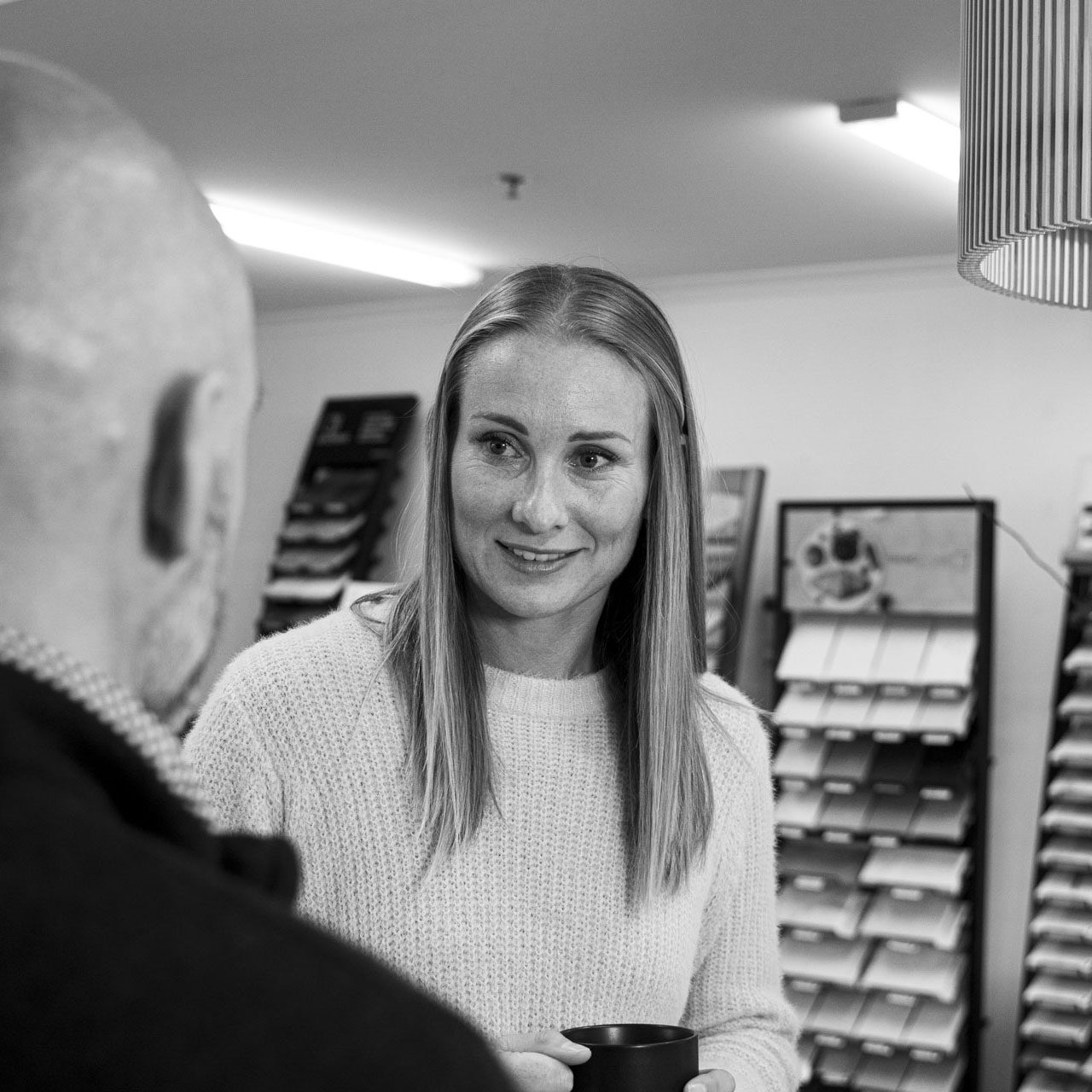Team member with customer in showroom